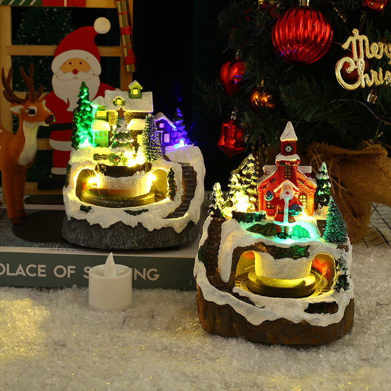 Rotating Christmas train resin decoration on wooden platform with festive details Main image