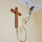 Creative faith wall decor featuring bouncing Jesus crucifix in black