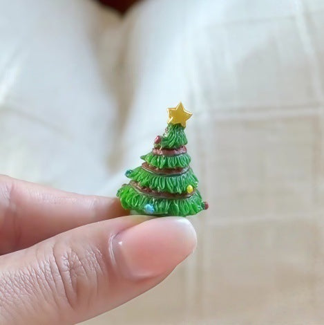 Set of 3 hinged Christmas ornaments displayed on tree branches