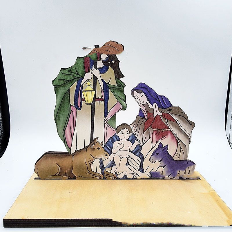 Wooden Christmas nativity decoration featuring detailed carved figures standing on natural wood base