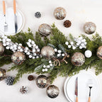 Group of 12 classical Christmas ornaments displaying varied gold tones