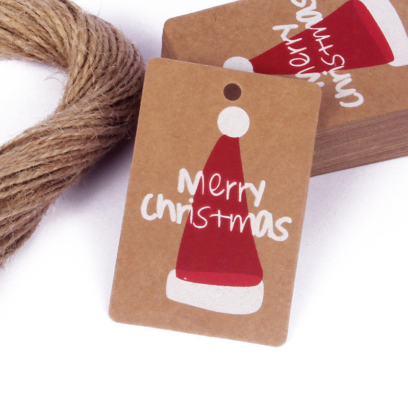 Set of 50 vintage kraft paper Christmas tags in various festive shapes
