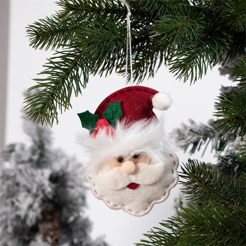 White snowman pendants arranged in festive winter scene