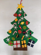 Children creating Christmas tree decorations together