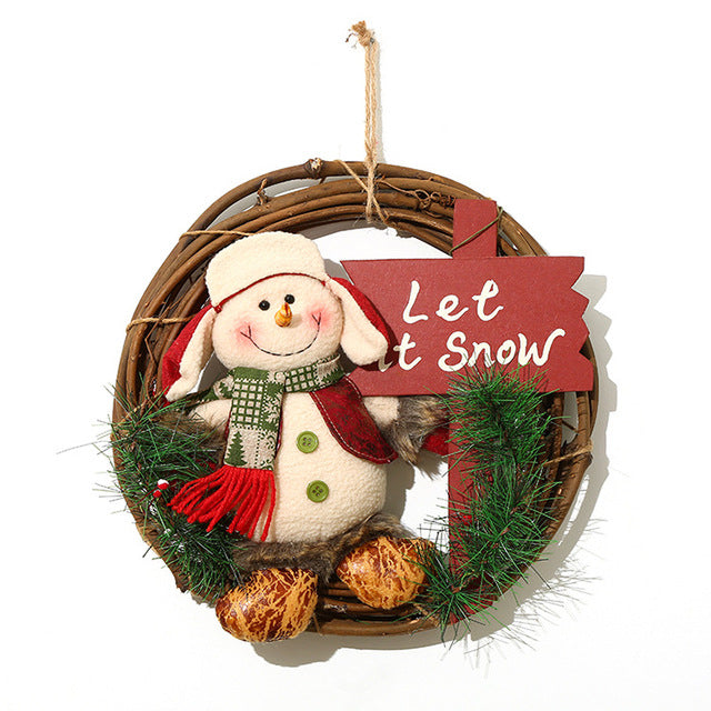 Holiday wreath with plush doll and Merry Christmas message for fireplace display
