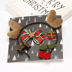 Holiday cloth ornament set featuring festive designs and colors