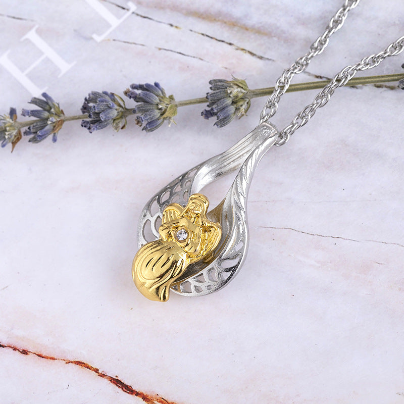 Jesus pendant detail showing colorful religious image on necklace