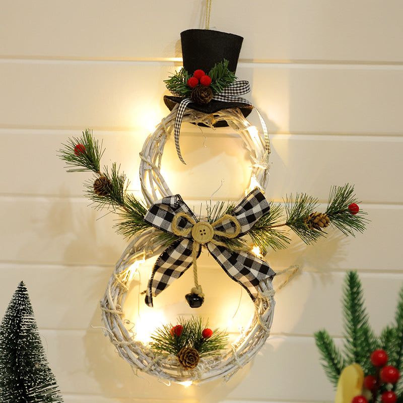 LED lit Christmas pendant displayed among festive decorations and holiday elements