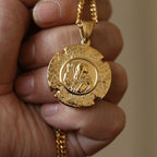 Jesus pendant necklace close-up showing religious portrait detail