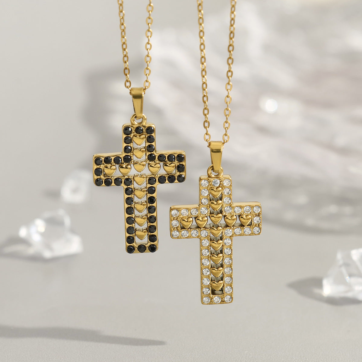 Cross pendant necklace featuring stainless steel gold-tone plating