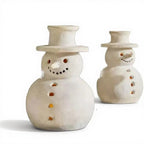 Three-piece snowman ornament set arranged together showing size variation for holiday display
