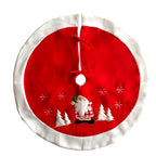 Christmas tree skirt displayed under decorated holiday tree