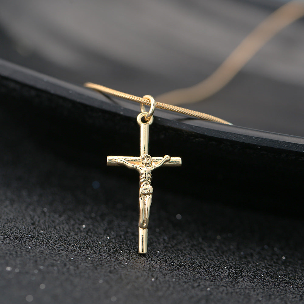 Gold-plated cross pendant close-up