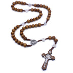 Handmade wooden rosary necklace with cross pendant close-up