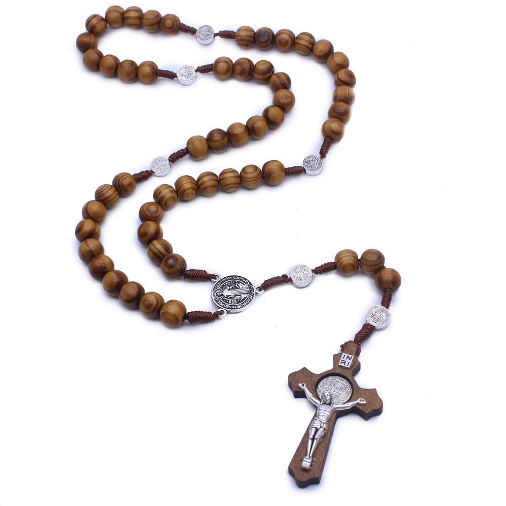 Handmade wooden rosary necklace with cross pendant close-up