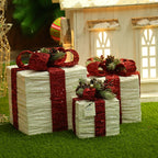Three-piece red wrought iron Christmas gift boxes arranged together