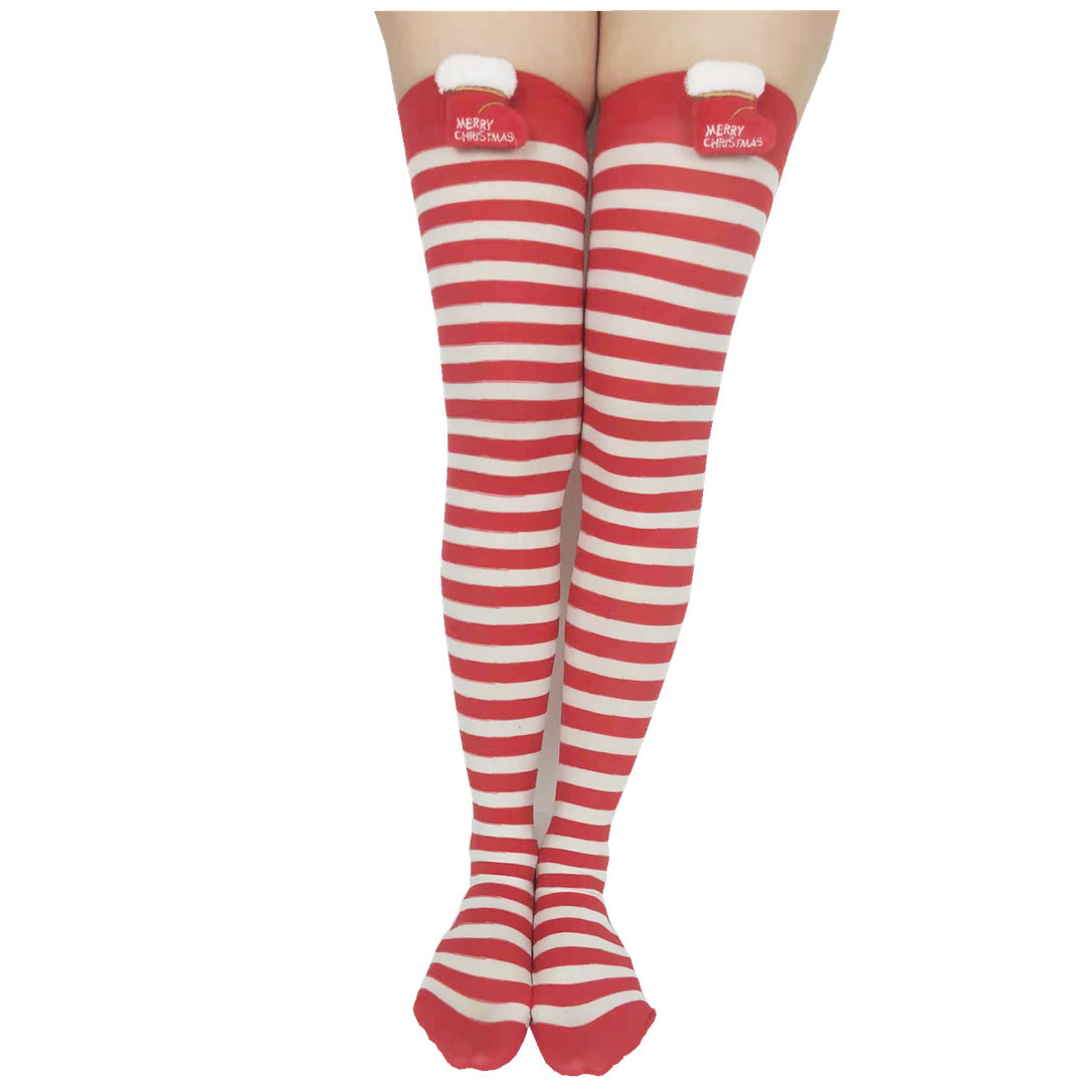 Green and white striped socks featuring a Christmas tree design