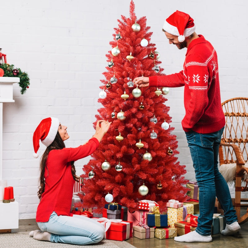 Stacked red Christmas trees in multiple sizes showing the variety of available options