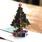 Festive dimensional Christmas card design perfect for sharing Christmas and New Year blessings