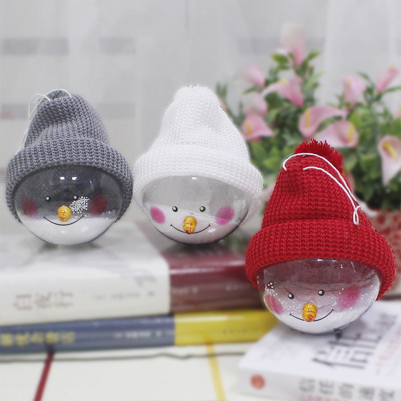 Plastic snowman Christmas pendant displayed as tree ornament