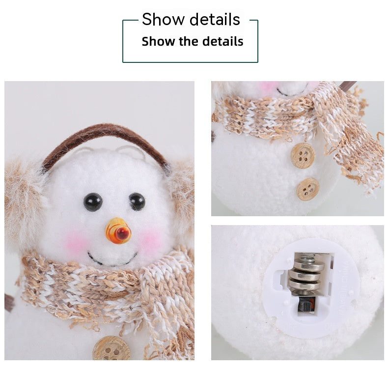 Winter-themed ornament with scarf detail and warm glow