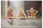 Wooden five-pointed star ornament hanging on Christmas tree
