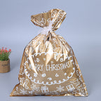 Colorful Christmas gift bags with bows in blue gold green