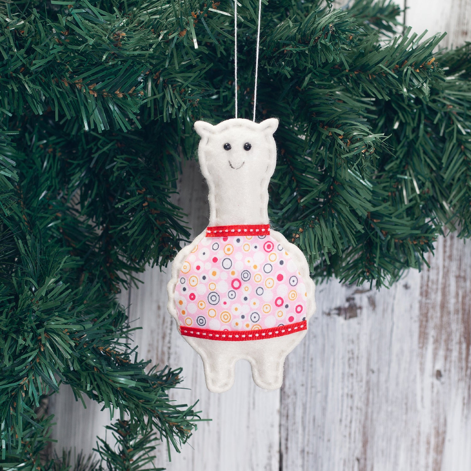 Four-piece alpaca crane pendant set for Christmas tree display
