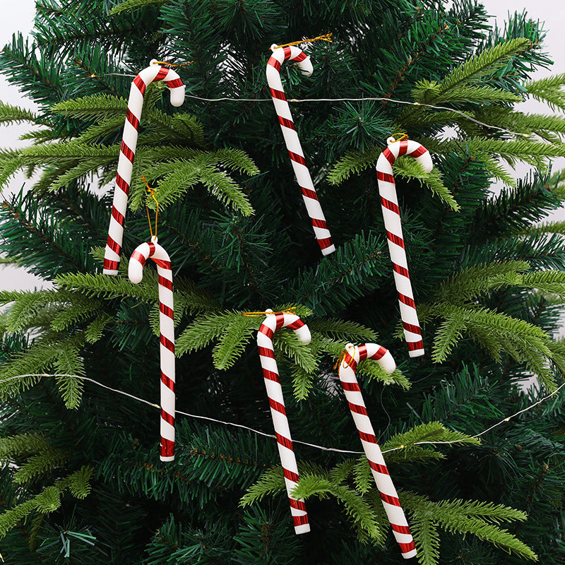 Close-up of red and white decorative crutches for Christmas trees
