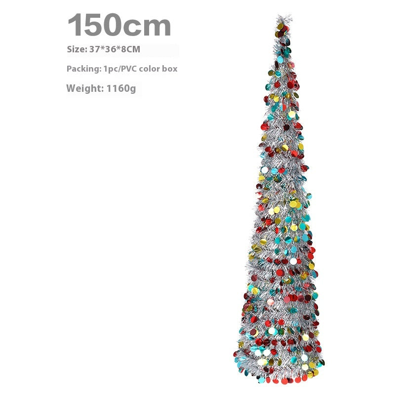 Colorful Christmas tree with twinkling lights representing holiday joy