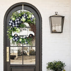 Orange Christmas wreath with handmade detail for front door display