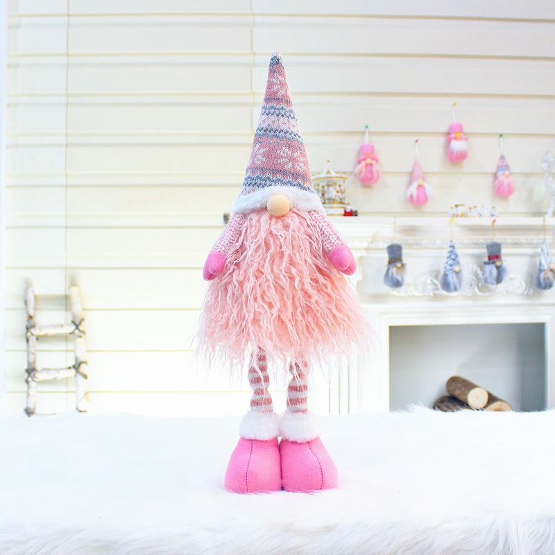 Multiple faceless doll decoration variants on display