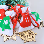 24 felt Christmas countdown bags arranged for holiday decorating