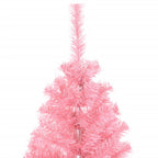 Stylish pink Christmas tree as holiday centerpiece in home setting