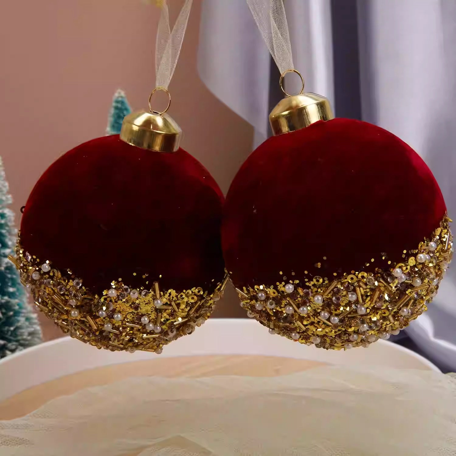 Burgundy flocked glass Christmas ornament with ribbon hanger detail