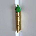 Creative hinged Christmas ornament detail showing elegant design