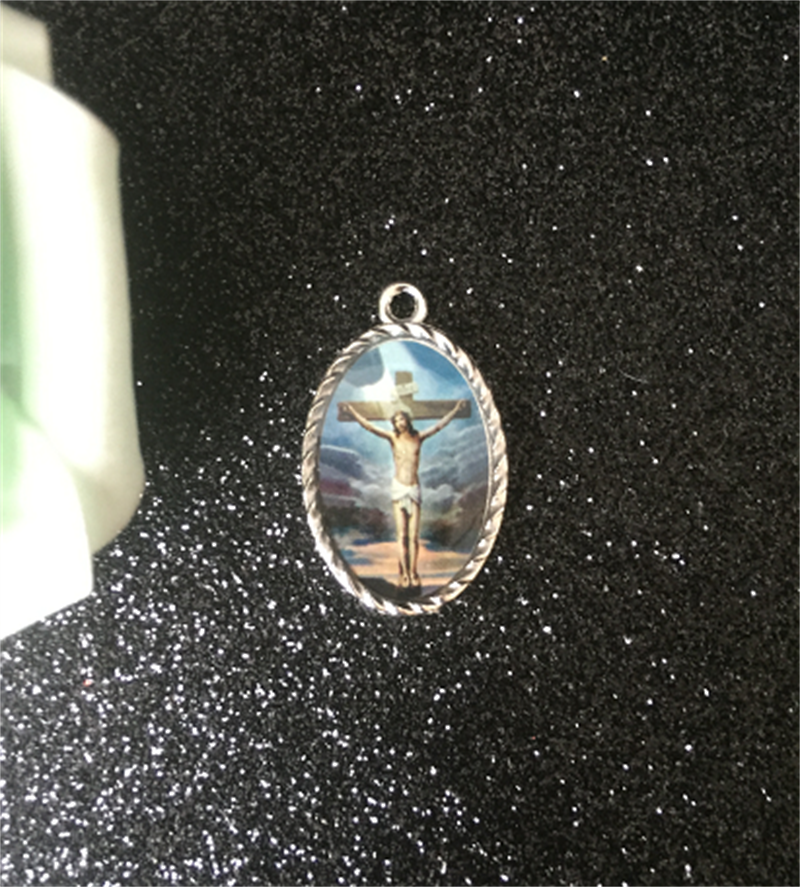 Sacred Heart Holy Family pendant necklace in zinc alloy with religious imagery
