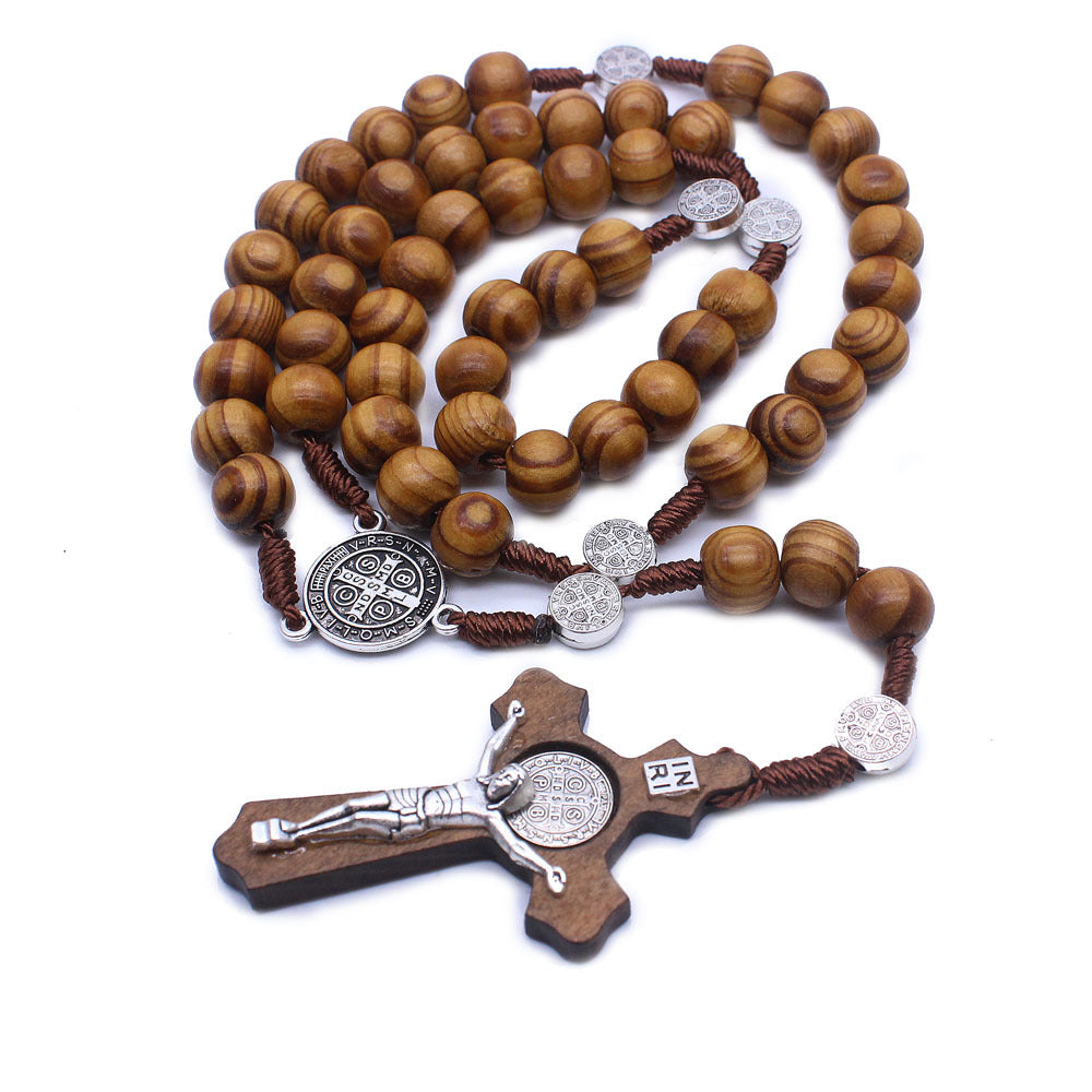Handmade wooden rosary necklace flat lay