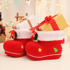 Set of festive red candy boots as Christmas decorations