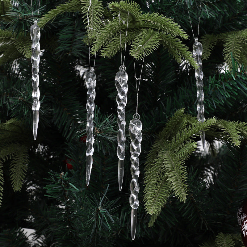 Transparent decorative pendants arranged for holiday gift presentation