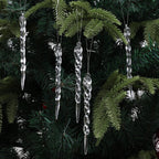Transparent decorative pendants arranged for holiday gift presentation