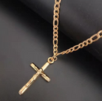 Cross pendant necklace displayed flat against a soft surface with spiritual elegance
