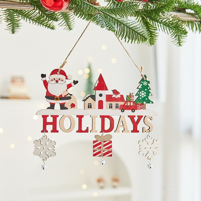 Gift bag style wooden Christmas ornament with charming holiday motif