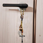 St Benedict Medal and Cross decoration styled on marble surface