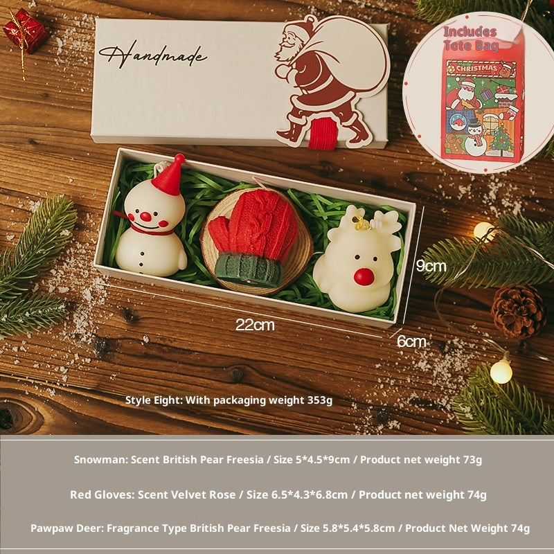 Soy wax and paraffin Christmas candle with holiday motifs