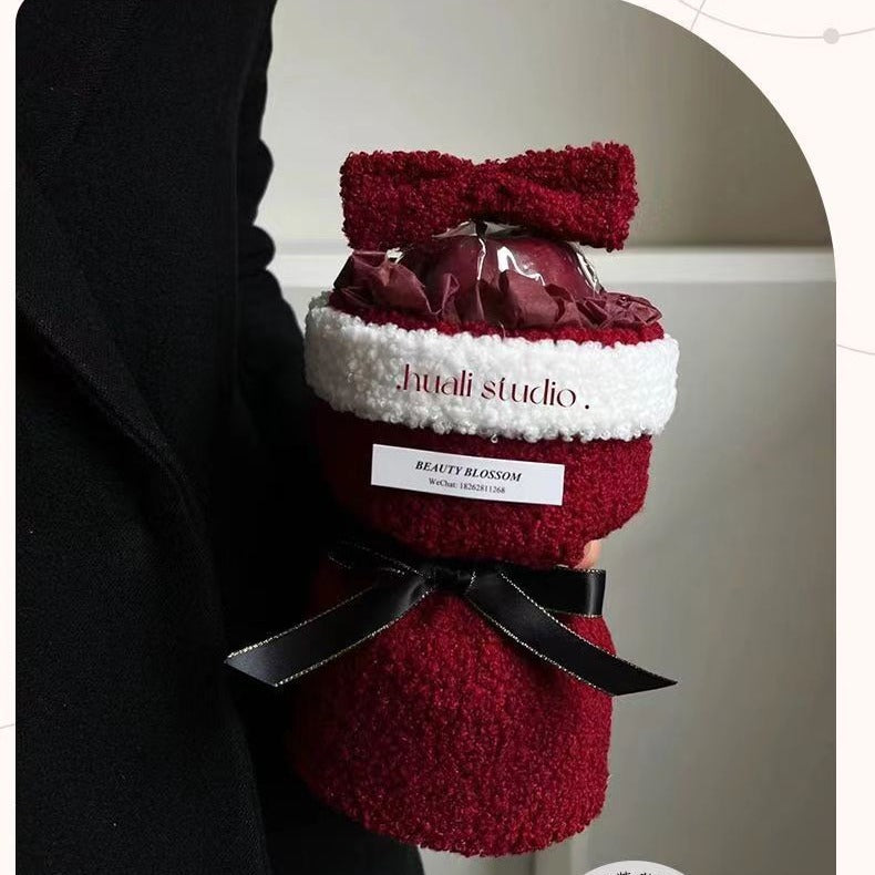 Holiday fruit bouquet centerpiece with single bow detail
