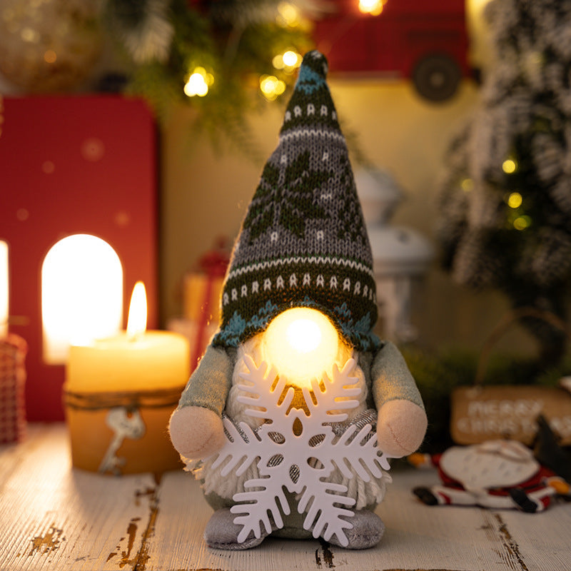 Whimsical Christmas nose decoration displayed among festive evergreen branches