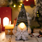 Whimsical Christmas nose decoration displayed among festive evergreen branches