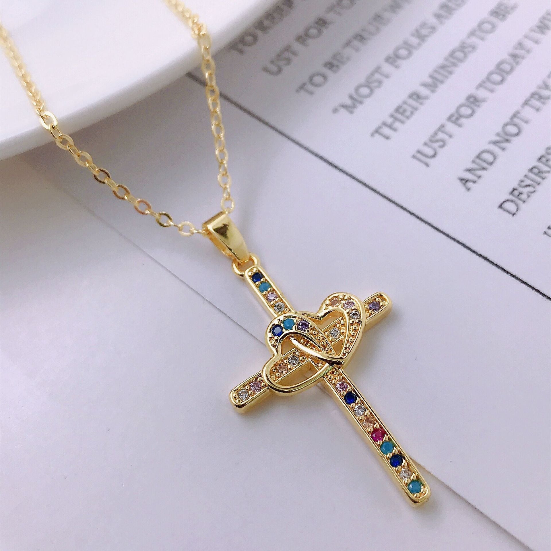 Stylized view of faith cross necklace with extender chain