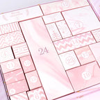 Red and pink advent calendar gift boxes displayed together for Christmas preparation - family devotion